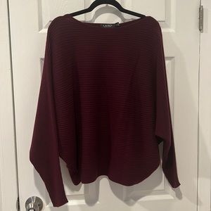 Never worn bat winged sweater